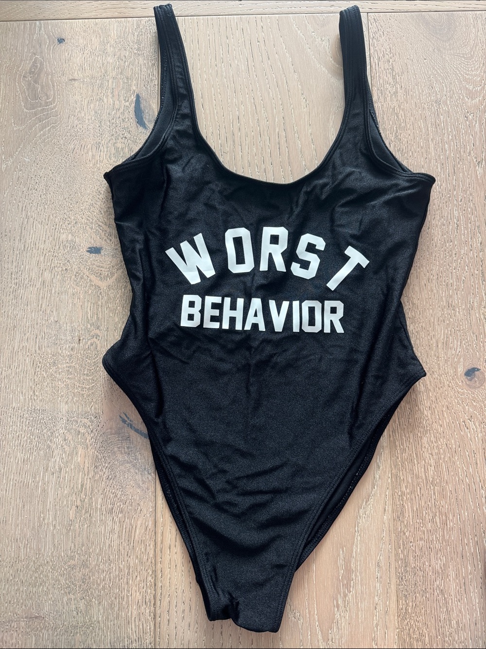 Black "Worst Behavior" Scoop Back One-Piece Swimsuit